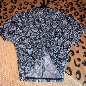 cute snakeskin mesh going out top from Garage